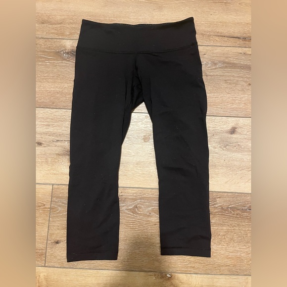 lululemon athletica Pants - Lululemon Mid-rise knee-length black leggings